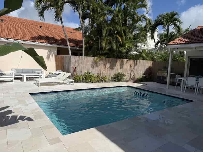 Weekly pool service on a clean Delray Beach pool