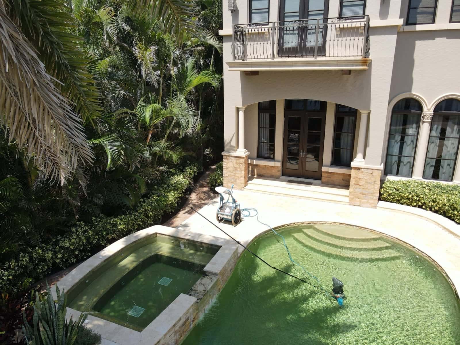 Green pool recovery on a lake-front Coconut Creek property