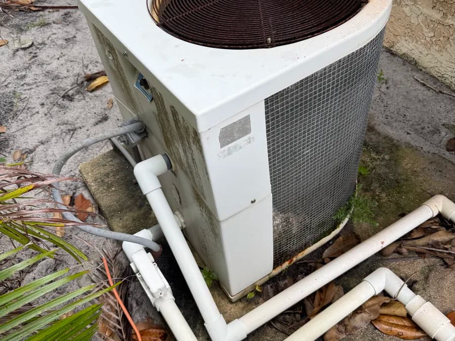 Old corroded pool heater in South Florida due for replacement