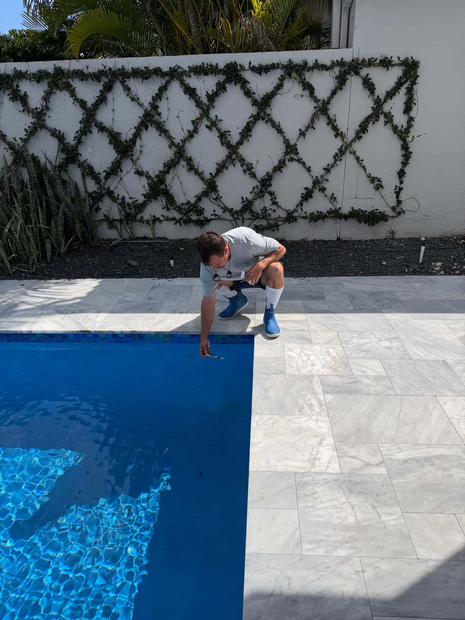 Water testing on a Boca Raton pool deck